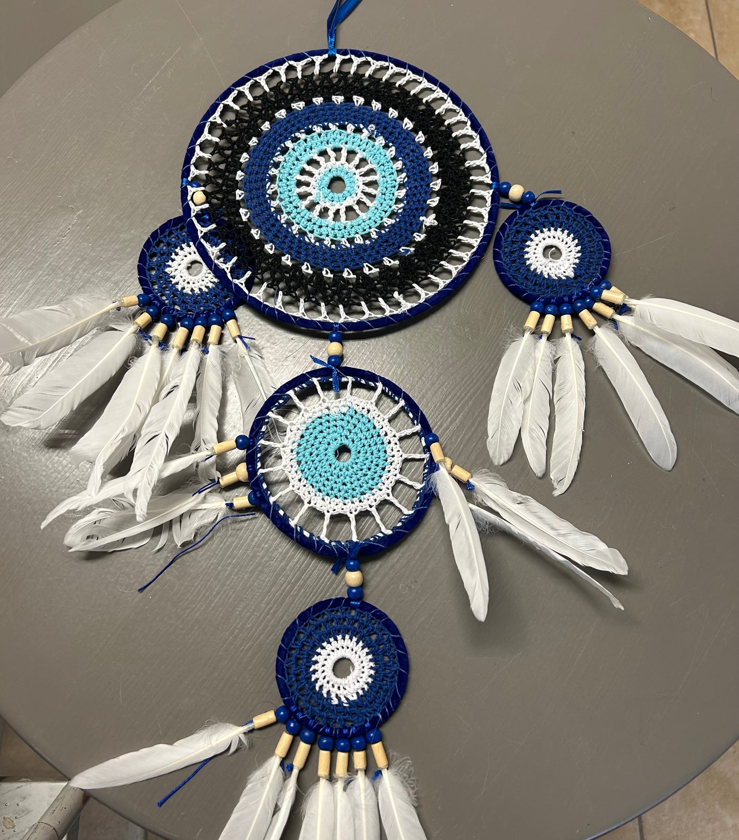 Large Dream Catcher Featuring 4 Circles and White Feathers