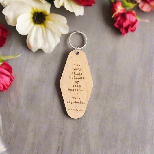 Retro Wooden Hotel Keychain Holding It